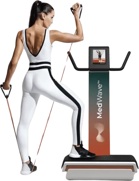 A woman standing on the Medwave Hypervibe vibration plate