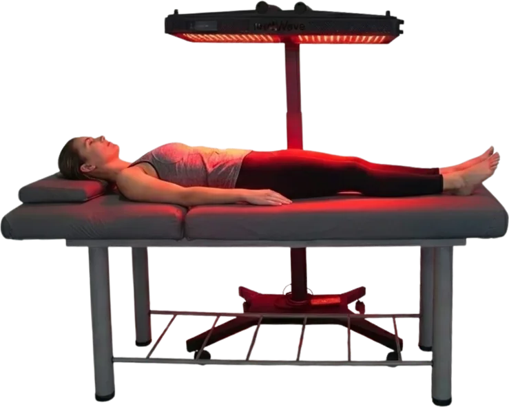 The Medwave Neuro-100s Medbed with a client lying under the light
