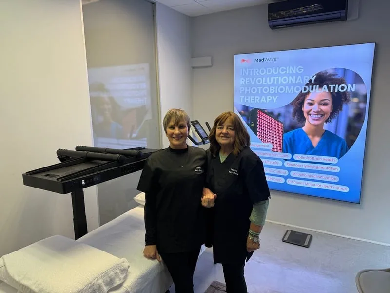 Paulette and Colleen in the Aura Wave treatment room